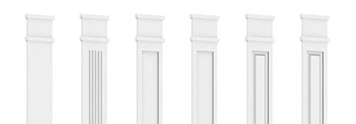 Elegant white pilasters showcasing various designs, highlighting customization options for architectural elements in home decor. Stylish details enhance any interior or exterior space.